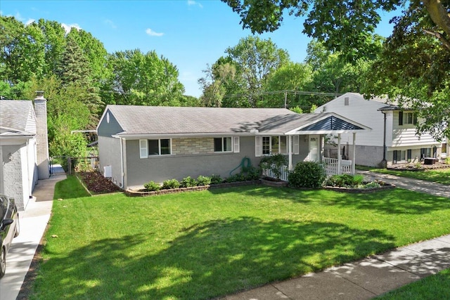 35519 Canyon Dr, Westland, MI 48186 - view of front of property featuring a front yard, a porch, and roof with shingles