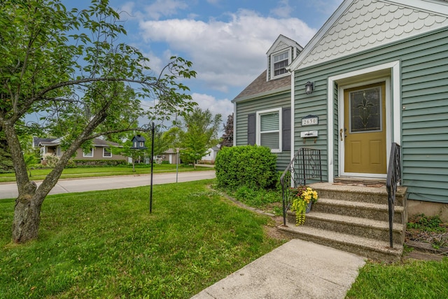 2630 Willa Dr, Saint Joseph, MI 49085 - doorway to property with a lawn