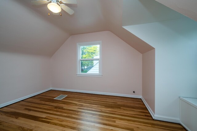 2630 Willa Dr, Saint Joseph, MI 49085 - bonus room with wood finished floors, baseboards, vaulted ceiling, and ceiling fan