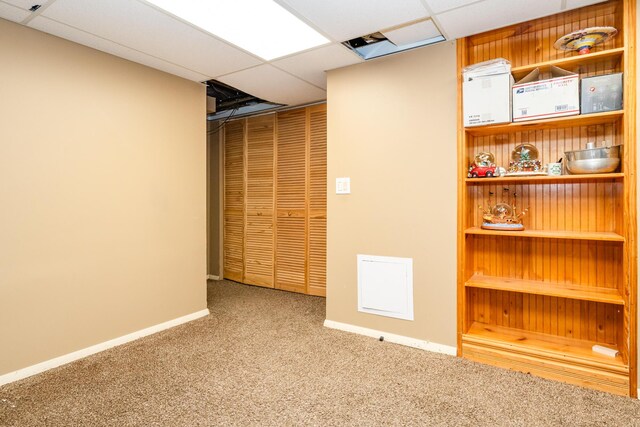 2630 Willa Dr, Saint Joseph, MI 49085 - finished basement with carpet, a drop ceiling, and baseboards