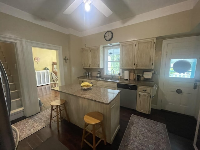 7100 Wing Lake Rd, Bloomfield Hills, MI 48301 - kitchen with dishwasher, a center island, a breakfast bar area, dark wood-type flooring, and a ceiling fan