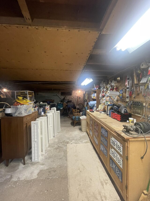 7100 Wing Lake Rd, Bloomfield Hills, MI 48301 - unfinished basement featuring a workshop area