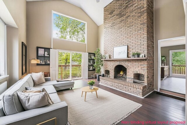 5643 Ivanrest Ave SW, Wyoming, MI 49418 - living area featuring high vaulted ceiling, a fireplace, and hardwood / wood-style floors
