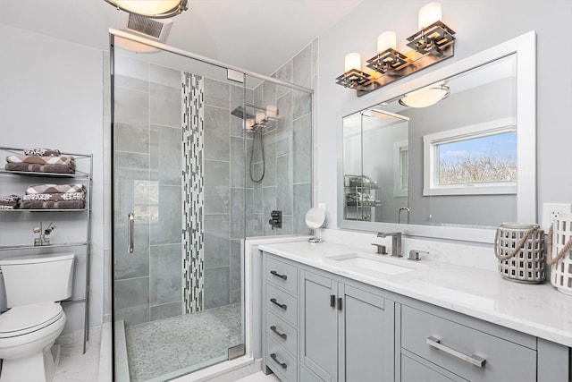 403 N Helen Ave, Rochester, MI 48307 - bathroom featuring toilet, vanity, a stall shower, and marble finish floors