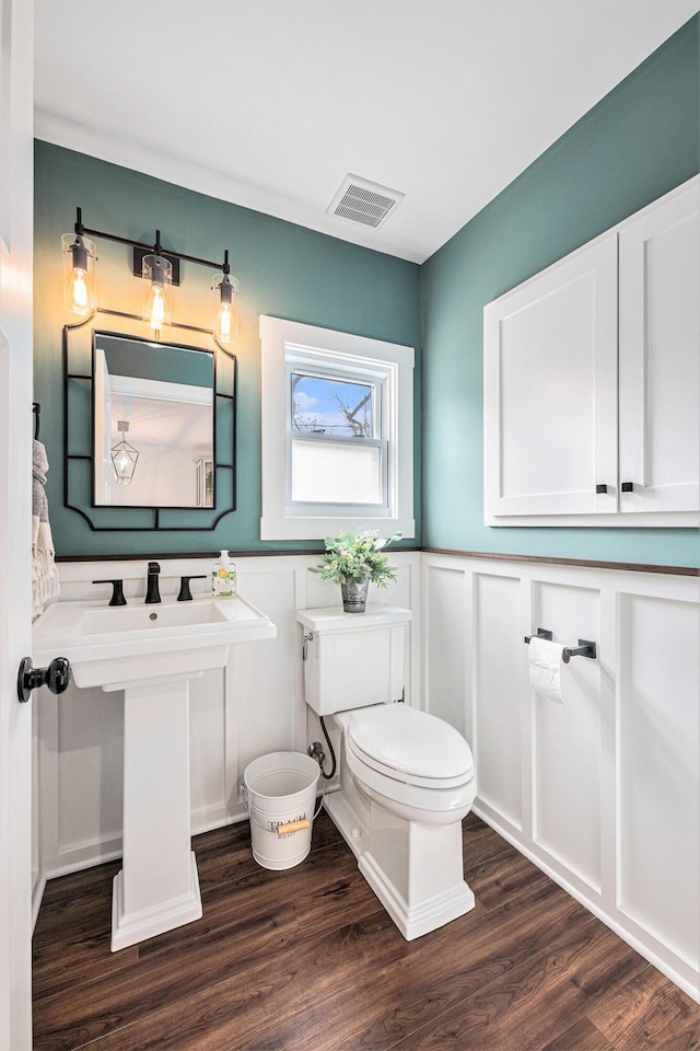 403 N Helen Ave, Rochester, MI 48307 - half bath with wainscoting, a decorative wall, wood finished floors, and toilet
