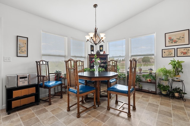 8761 Aveling Way, Richland, MI 49083 - dining room featuring a chandelier and vaulted ceiling