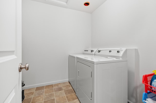 8761 Aveling Way, Richland, MI 49083 - washroom with separate washer and dryer and baseboards