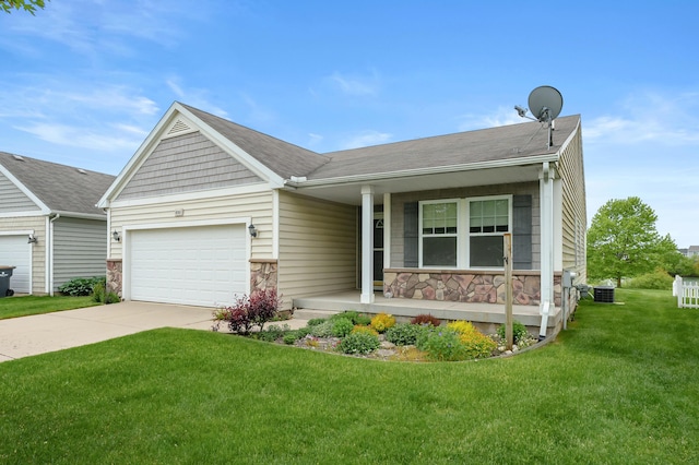 8761 Aveling Way, Richland, MI 49083 - view of front of property featuring stone siding, a porch, an attached garage, and a front lawn