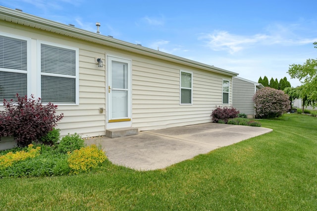 8761 Aveling Way, Richland, MI 49083 - back of house with a patio area and a yard