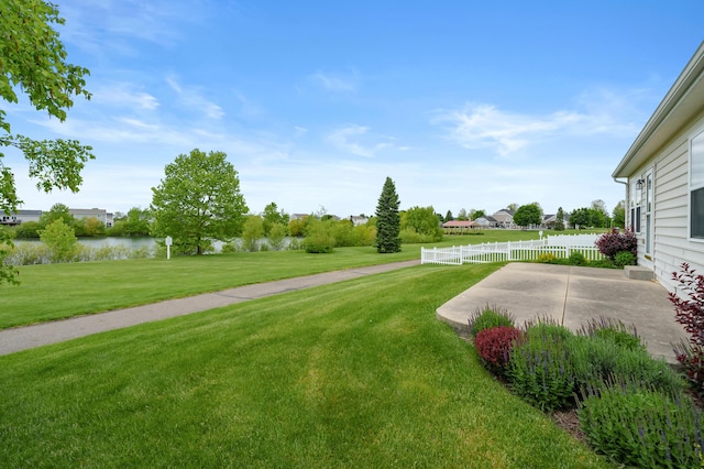 8761 Aveling Way, Richland, MI 49083 - view of yard featuring a patio area and a water view