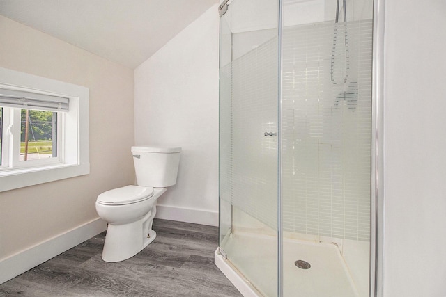 512 E Cass St, Schoolcraft, MI 49087 - bathroom with toilet, a shower stall, baseboards, and wood finished floors