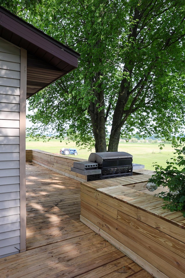 1041 W Arthur Rd, Rothbury, MI 49452 - wooden terrace with area for grilling