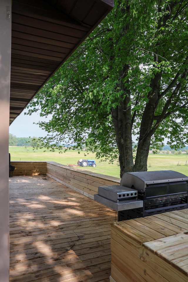 1041 W Arthur Rd, Rothbury, MI 49452 - wooden terrace with a grill