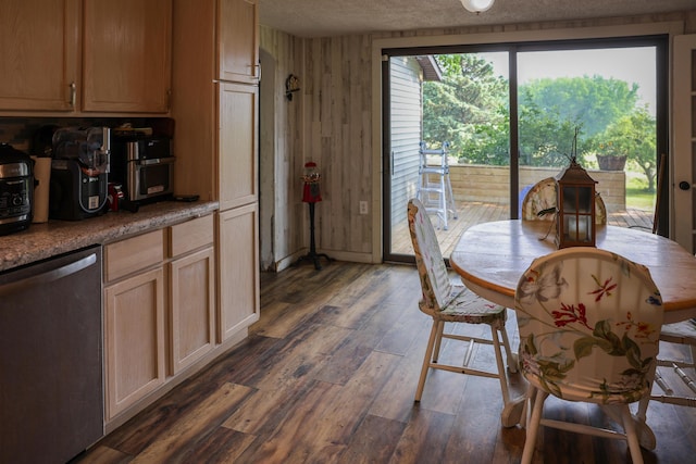 1041 W Arthur Rd, Rothbury, MI 49452 - dining room with dark wood-type flooring, a textured ceiling, and wooden walls
