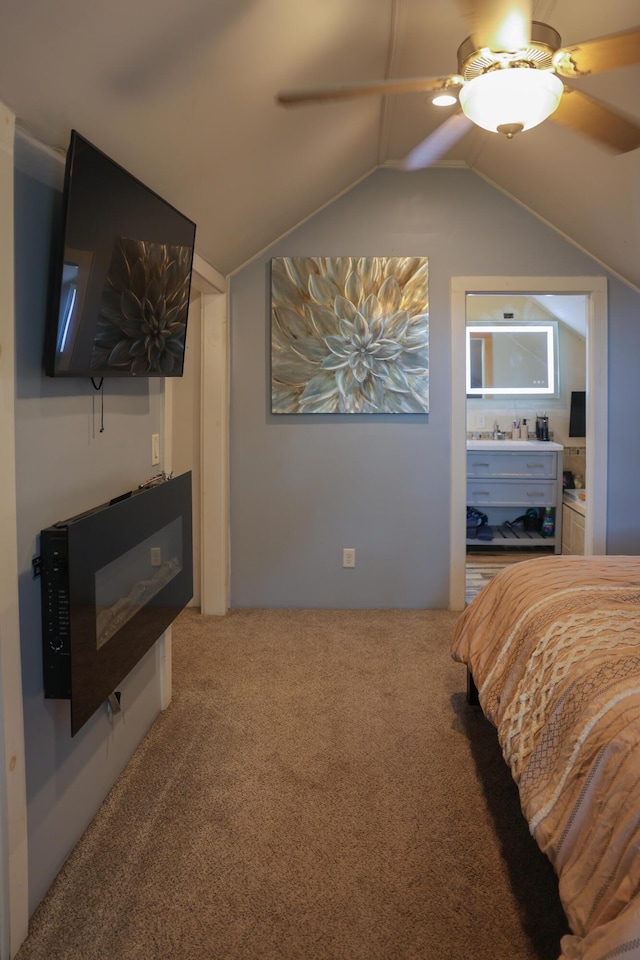 1041 W Arthur Rd, Rothbury, MI 49452 - carpeted bedroom with a ceiling fan and vaulted ceiling
