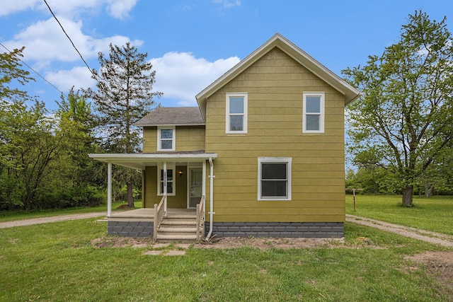 12856 Flynn Rd, Sawyer, MI 49125 - view of front of home featuring a porch, a front yard, and a shingled roof