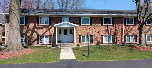 5230 Southbrook Ct Unit 78, Hudsonville, MI 49426 - view of front of home with brick siding and a front yard