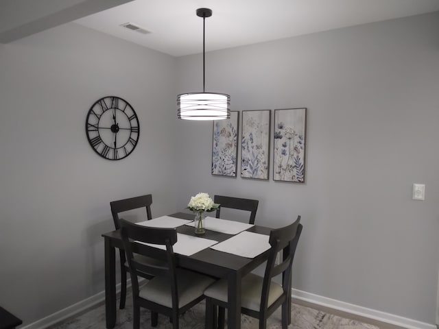 5230 Southbrook Ct Unit 78, Hudsonville, MI 49426 - dining area with baseboards and wood finished floors