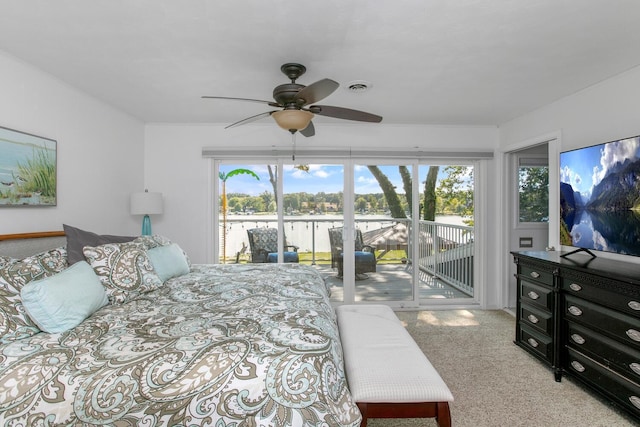 17437 Lakeview Dr Unit 100, Vandalia, MI 49095 - carpeted bedroom with access to outside and ceiling fan