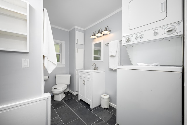 115 Mckinley St, Chelsea, MI 48118 - bathroom featuring stacked washer / dryer, ornamental molding, vanity, toilet, and baseboards