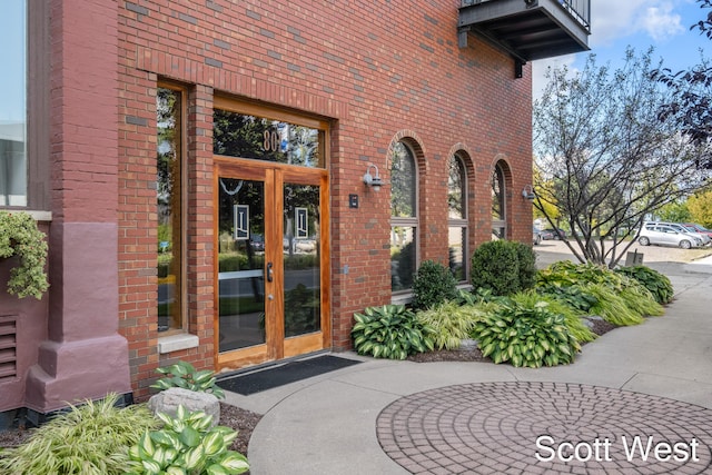 801 Monroe Ave NW Unit 402, Grand Rapids, MI 49503 - property entrance with brick siding and french doors