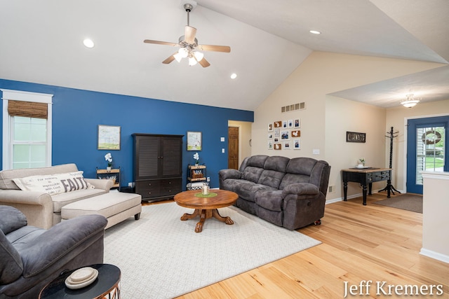 7153 Keystone Ct, Jenison, MI 49428 - living area featuring light wood finished floors, a ceiling fan, high vaulted ceiling, baseboards, and recessed lighting
