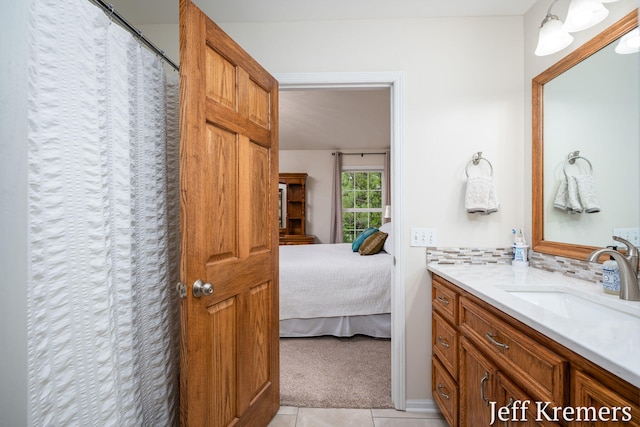 7153 Keystone Ct, Jenison, MI 49428 - full bath featuring vanity, tile patterned flooring, connected bathroom, and curtained shower