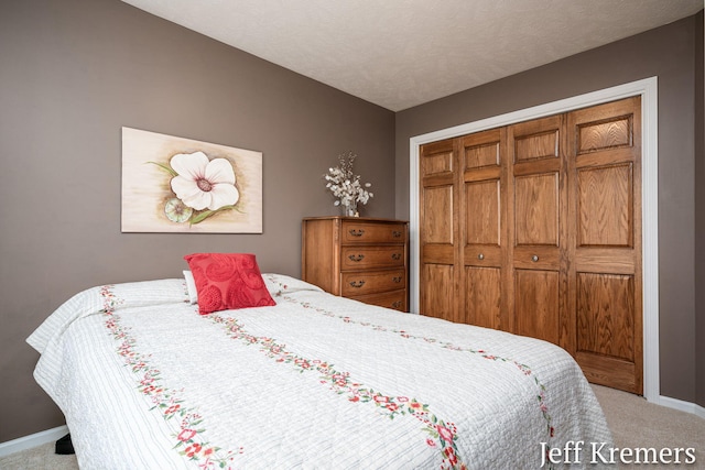 7153 Keystone Ct, Jenison, MI 49428 - bedroom featuring carpet floors, baseboards, and a closet