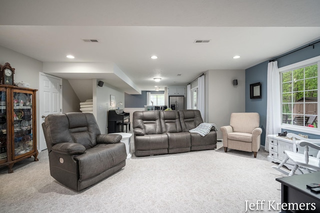7153 Keystone Ct, Jenison, MI 49428 - carpeted living room featuring stairs and recessed lighting