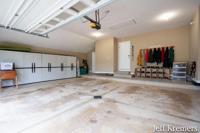 7153 Keystone Ct, Jenison, MI 49428 - garage with a garage door opener and baseboards