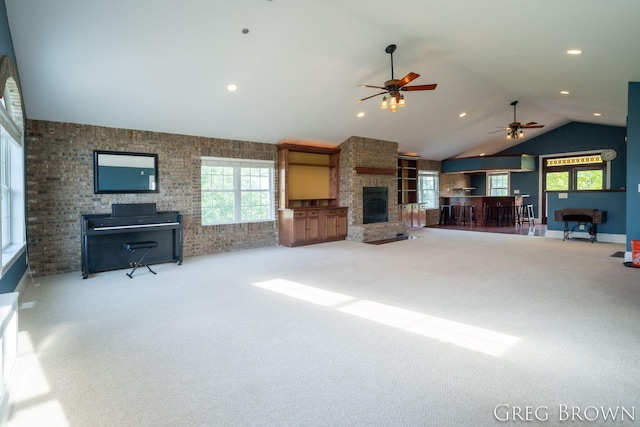 9318 Jefferson Rd, Lakeview, MI 48850 - unfurnished living room featuring a fireplace, vaulted ceiling, carpet, ceiling fan, and recessed lighting