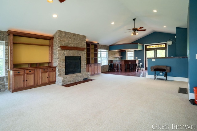9318 Jefferson Rd, Lakeview, MI 48850 - living area with a ceiling fan, carpet flooring, a fireplace, vaulted ceiling, and recessed lighting
