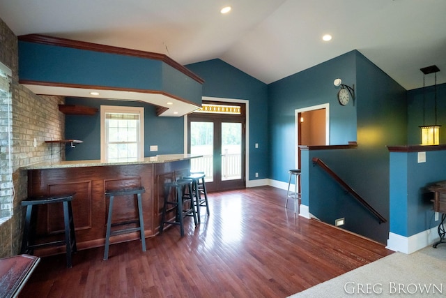 9318 Jefferson Rd, Lakeview, MI 48850 - kitchen featuring lofted ceiling, wood finished floors, stone countertops, baseboards, and french doors