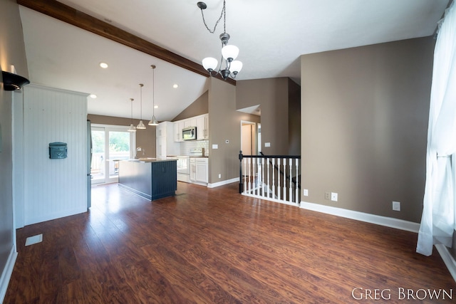 9318 Jefferson Rd, Lakeview, MI 48850 - unfurnished living room featuring dark wood-style flooring, a chandelier, baseboards, and recessed lighting
