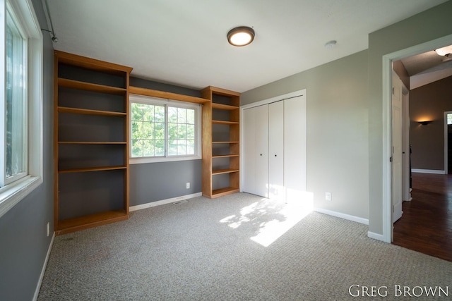 9318 Jefferson Rd, Lakeview, MI 48850 - unfurnished bedroom with carpet, baseboards, and a closet