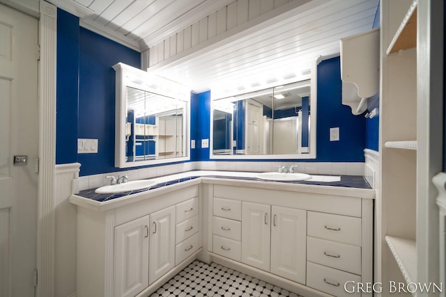 9318 Jefferson Rd, Lakeview, MI 48850 - bathroom featuring double vanity and ornamental molding