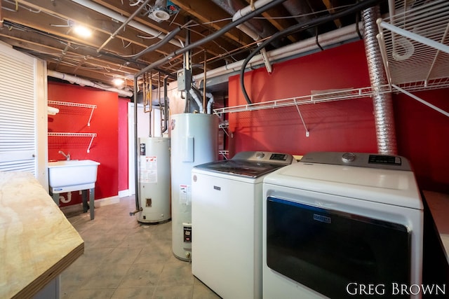 9318 Jefferson Rd, Lakeview, MI 48850 - laundry room featuring gas water heater, washing machine and clothes dryer, and water heater