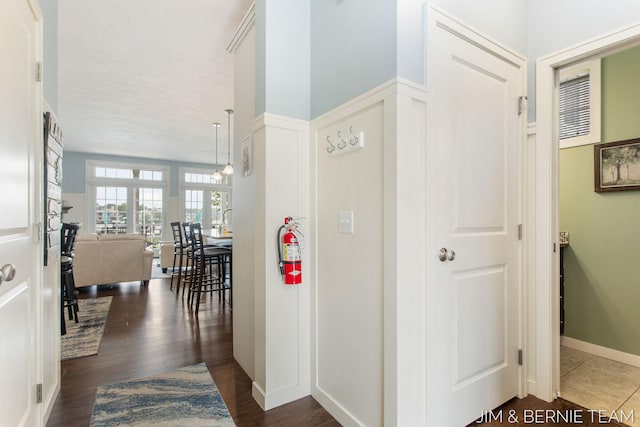807 Lake St Unit 7, Saugatuck, MI 49453 - corridor featuring dark wood finished floors