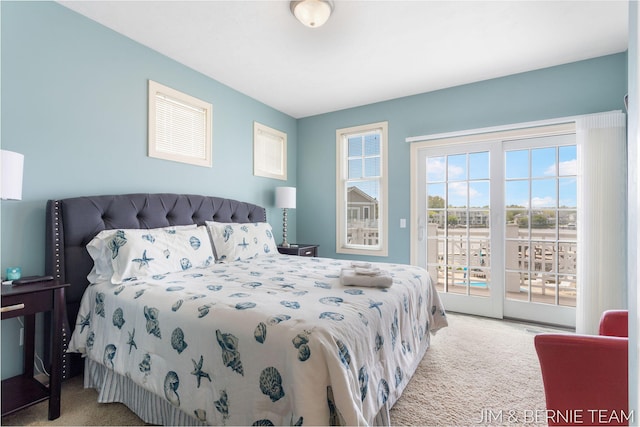 807 Lake St Unit 7, Saugatuck, MI 49453 - carpeted bedroom featuring access to exterior