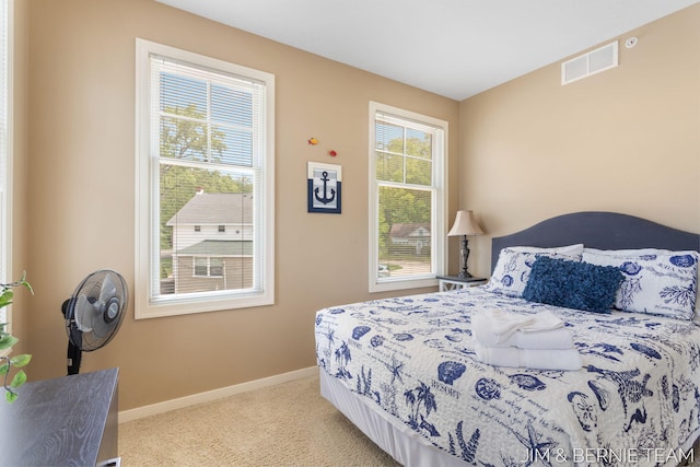 807 Lake St Unit 7, Saugatuck, MI 49453 - carpeted bedroom with baseboards
