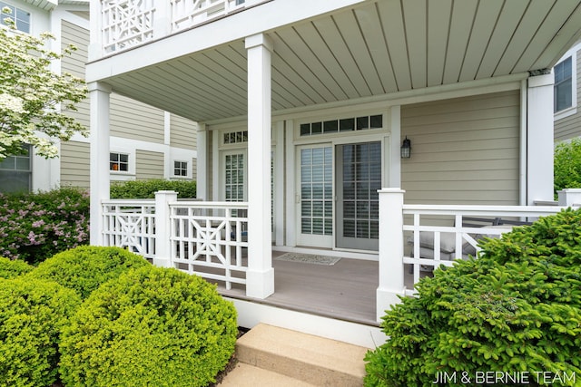 807 Lake St Unit 7, Saugatuck, MI 49453 - doorway to property featuring covered porch