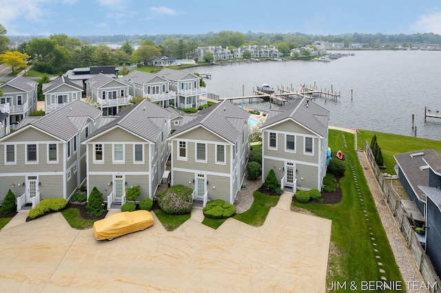 807 Lake St Unit 7, Saugatuck, MI 49453 - aerial perspective of suburban area with a nearby body of water