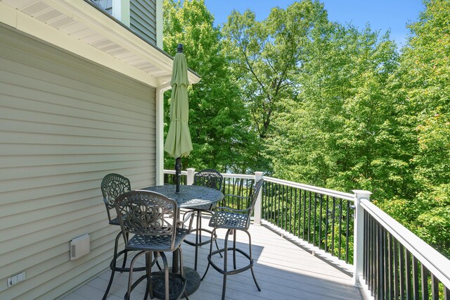 6461 E Bay Ln, Richland, MI 49083 - wooden terrace with outdoor dining space