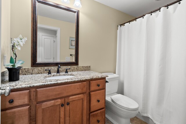 6461 E Bay Ln, Richland, MI 49083 - bathroom featuring toilet, vanity, and a shower with shower curtain