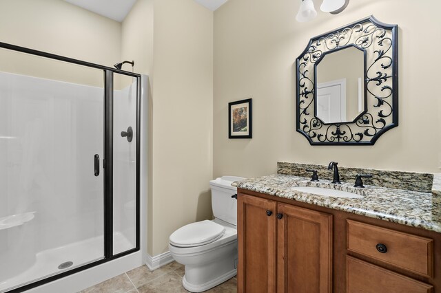 6461 E Bay Ln, Richland, MI 49083 - bathroom with toilet, a stall shower, vanity, baseboards, and tile patterned flooring