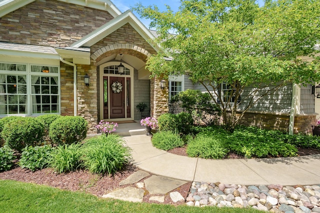 6461 E Bay Ln, Richland, MI 49083 - view of exterior entry featuring stone siding