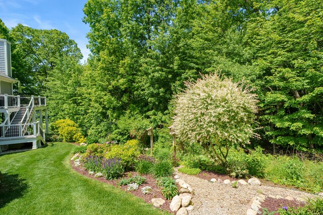 6461 E Bay Ln, Richland, MI 49083 - view of grassy yard with stairway and a deck