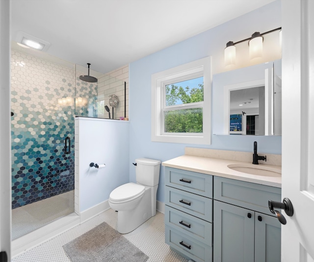 6201 Donovanridge, Dexter, MI 48130 - full bath featuring vanity, a stall shower, toilet, and tile patterned flooring