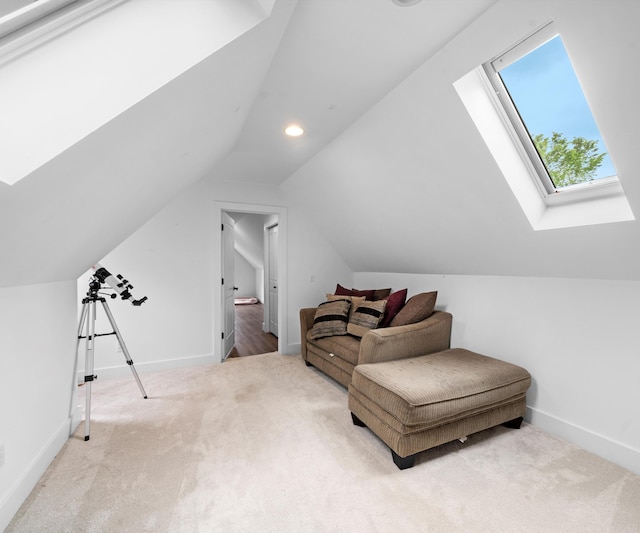 6201 Donovanridge, Dexter, MI 48130 - living area featuring a skylight, carpet flooring, lofted ceiling, baseboards, and recessed lighting