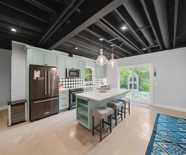 6201 Donovanridge, Dexter, MI 48130 - kitchen featuring appliances with stainless steel finishes, backsplash, light countertops, and baseboards